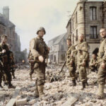 Tom Hanks and others as they appear in SAVING PRIVATE RYAN, 1998.
